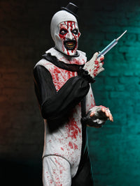 TERRIFIER - ULTIMATE ART THE CLOWN (BLOOD SPLATTERED) - 7" SCALE ACTION FIGURE - Packaging