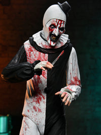 TERRIFIER - ULTIMATE ART THE CLOWN (BLOOD SPLATTERED) - 7" SCALE ACTION FIGURE